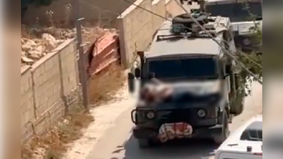 Palestino é amarrado em carro do Exército de Israel. Foto: reprodução