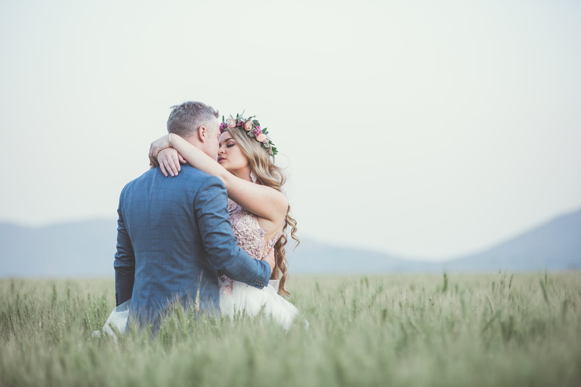 man and woman kissing