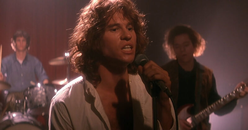 Val Kilmer como Jim Morrison, em The Doors (1991)