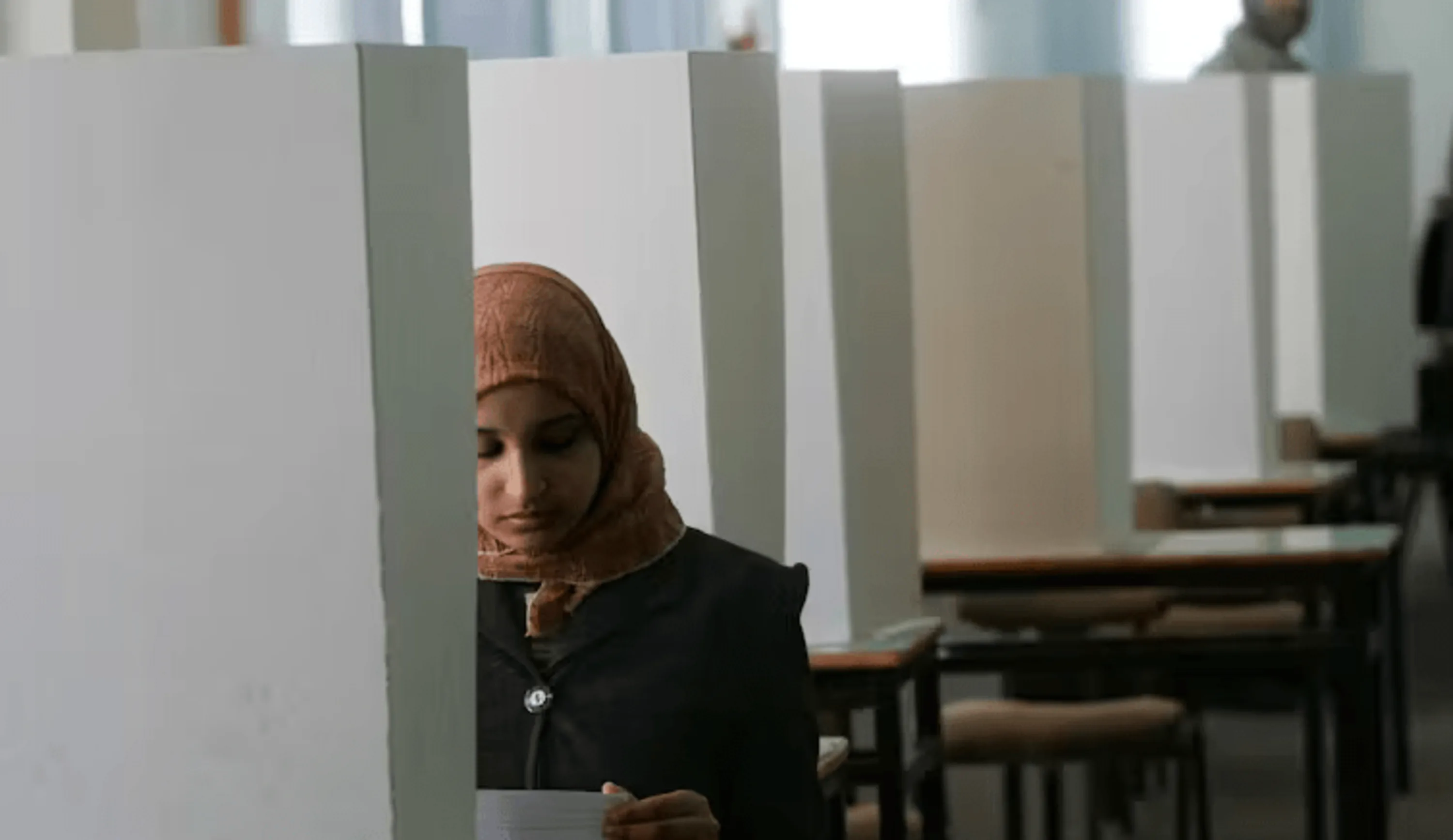 Um estudante universitário palestino vota na Cidade de Gaza em 2006. Abid Katib/Getty Images